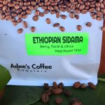 Bag of Ethiopian Sidama coffee beans with a bright green label