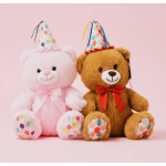 Two plush teddy bears wearing party hats and bows on a pink background