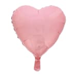 Pink heart-shaped foil balloon on a white background