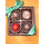 Box of four assorted chocolates tied with green ribbon