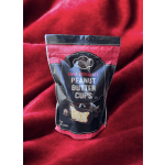 Bag of dark chocolate peanut butter cups on red fabric