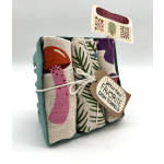 Set of three printed dish towels in a teal tray with mushroom and foliage designs