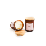 Two apple pie scented candles in amber glass jars with wooden lids