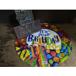 Birthday balloon with colorful gift graphics and a small decorative sign
