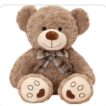 Brown teddy bear with a plaid bow sitting on a white background