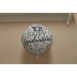 Round graduation balloon with multicolored confetti dots