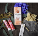 Gift set with blue flowers, lip balms, and an essential oil box