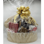 Gift basket with bottles and boxed treats wrapped in clear cellophane and a gold bow