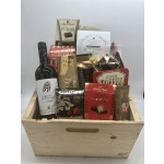 Gift basket with wine and assorted chocolates in a wooden crate