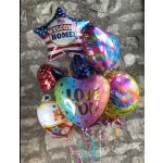 Cluster of colorful foil balloons with "Welcome Home" and "Love You" messages