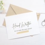 Handwritten card on an envelope with scissors nearby