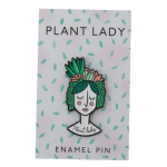 Plant lady enamel pin on a patterned backing card