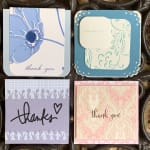 Four decorative thank-you cards with floral and patterned designs
