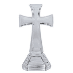 Clear glass cross-shaped decorative stand on a white background