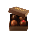 Box of assorted chocolate truffles with the lid open