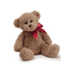 Brown teddy bear with a red ribbon bow