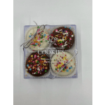 Box of four chocolate-covered cookies with colorful sprinkles