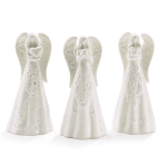 Three white angel figurines with heart details