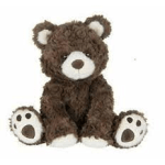 Brown teddy bear with white muzzle and paw pads