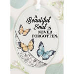 Decorative memorial plaque with butterflies and the words "A Beautiful Soul is Never Forgotten."