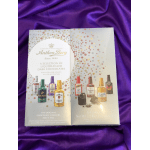 Box of liquor-filled chocolates on purple satin fabric
