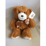 Brown teddy bear with a satin bow and tag