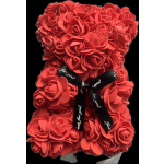 Red rose-shaped teddy bear with a black ribbon bow