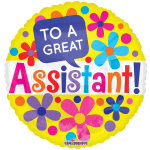 Round yellow balloon with colorful flowers and "To a Great Assistant!" text