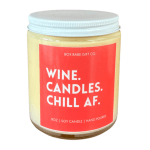 Soy candle in a glass jar with a red label and white lid