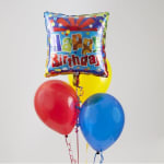 Birthday balloon bouquet with a square foil balloon and three latex balloons