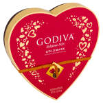 Red heart-shaped box of assorted chocolates with gold accents and ribbon