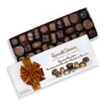 Box of assorted chocolates with a decorative ribbon on the lid