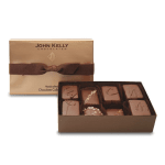 Gold gift box of assorted gourmet chocolates with the lid tied in a wide brown ribbon.