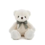 White teddy bear with a plaid bow tie