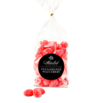 Bag of red cherry candies with a black label
