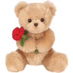 Plush teddy bear holding a red rose