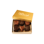 Open box of assorted chocolates with a gold lid