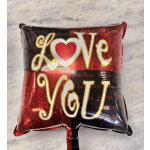 Heart-shaped foil balloon with "Love You" text