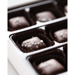 Box of chocolate truffles in paper cups