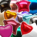 Assorted star and heart-shaped foil balloons in bright colors