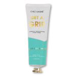 Tube of hand cream with white and teal packaging