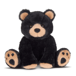 Black teddy bear plush with tan paws and muzzle