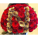 Bouquet of red and gold roses in a round arrangement