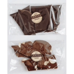 Two wrapped chocolate bark packs labeled espresso and cashew
