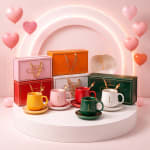 Pastel heart balloons surround colorful mugs and gift boxes on a round pedestal