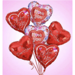 Cluster of heart-shaped red and pink balloons with love messages