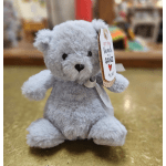 Small gray plush teddy bear with a ribbon and hanging tag
