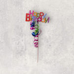 Colorful Happy Birthday pick with curled ribbons on a stick