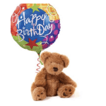 Teddy bear holding a colorful Happy Birthday balloon