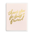 Pink thank-you card with gold script text
